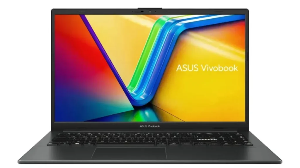 Notebook de entrada ASUS Vivobook Go 15 na cor preta, aberto de frente com a tela ligada exibindo o papel de parede oficial colorido em tons de azul, verde e laranja com a inscrição ASUS Vivobook à direita.